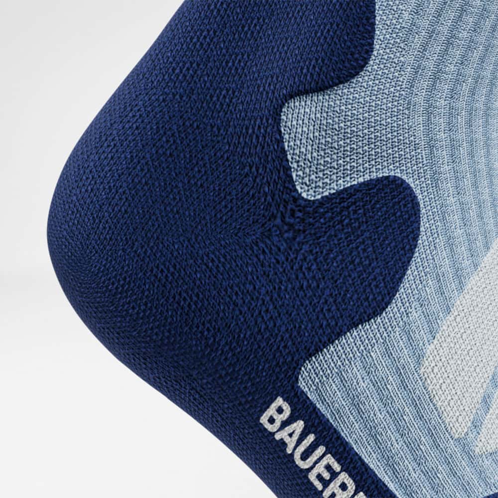 Mittellange Merino-Wandersocken hellblau Detail Heel Protection Detailaufnahme der Fersenschutzzone der hellblauen mittellangen Merino - Wandersocken