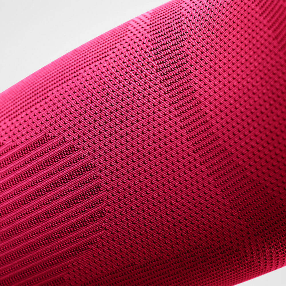 Ellenbogensleeve pink Detailansicht Detailansicht Gestrickverlaufe des pinken Sportsleeves für den Ellenbogen
