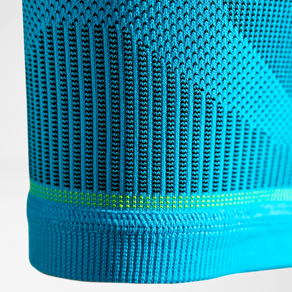 Waden Sleeves Detail Compression Zones Detailansicht der Unterschenkelsleeves mit Fokus auf den Gestrickverlauf am unteren Ende