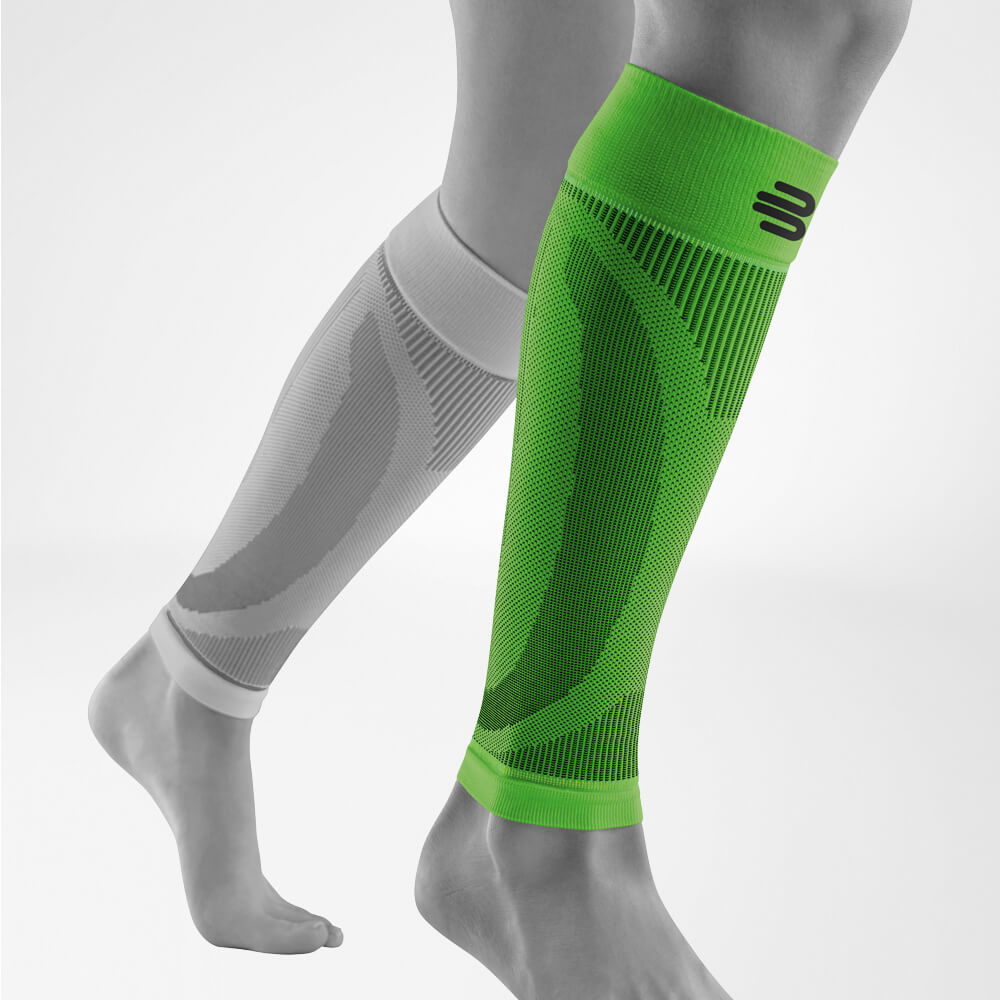 Komplettansicht der grünen Unterschenkel Sport Sleeves am stilisierten grauen Bein