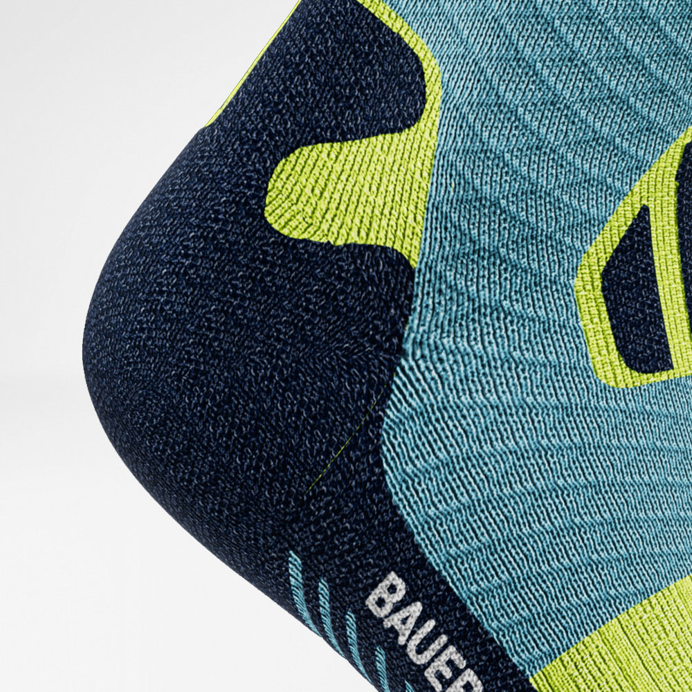Mittellange Trailrun-Laufsocken blau-gelb Detail Heel Protection Detailaufnahme Fersenschutzzone der blau-gelben mittellangen Trailrun - Laufsocken
